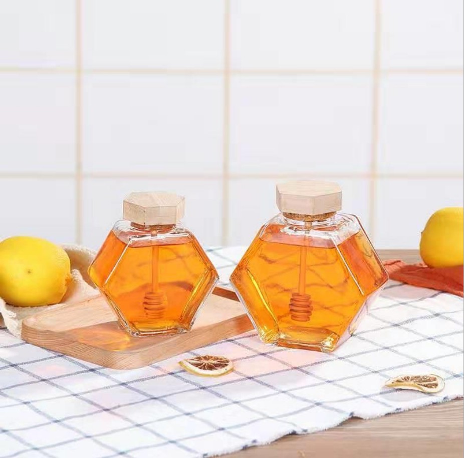Jars de miel de verre hexagone de haute qualité avec des couvercles de bambou